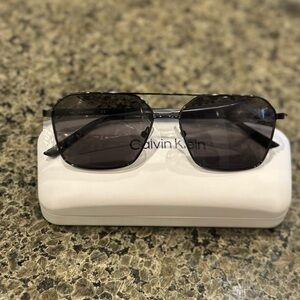 Calvin Klein Dark Gray Sunglasses with White Case